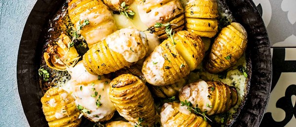 Hasselback roasties with Taleggio and thyme