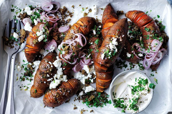 Hasselback sweet potatoes with sage and walnut pangrattato