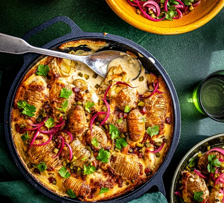 Hasselback tartiflette with pickle salad