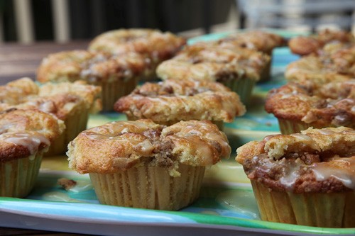 Hawaii inspired pom (pineapple, orange and mango) not pog muffins with macadamia nut crumb topping