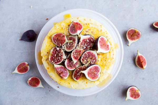 Hazelnut cake with frozen saffron yogurt and honey drizzled figs
