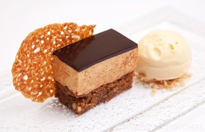 Hazelnut, caramel and sesame mousse cake with malt ice cream