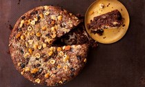 Hazelnut chocolate cake with sultanas and rosemary