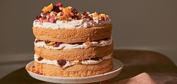 Hazelnut layer cake with roasted cherries and honeycomb