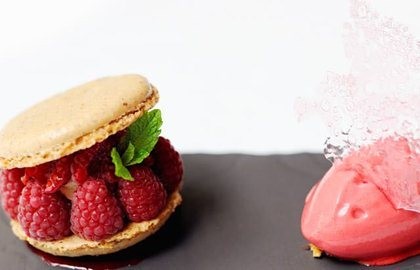 Hazelnut macarons with raspberry sorbet and rose opaline