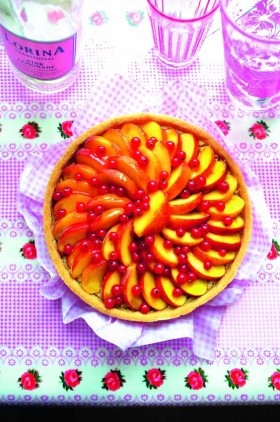 Hazelnut, peach and redcurrant frangipane tart