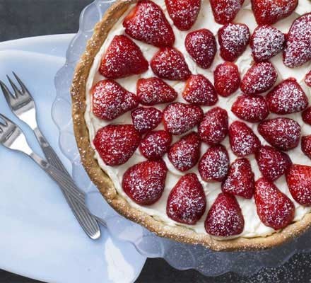 Hazelnut tart with orange mascarpone and strawberries