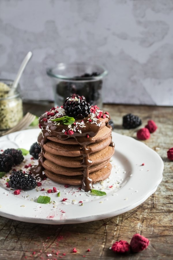 Healthier blender chocolate banana pancakes with chocolate sauce