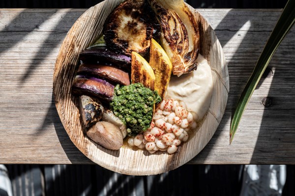 Hearth vegetable plate with white beans and salsa verde