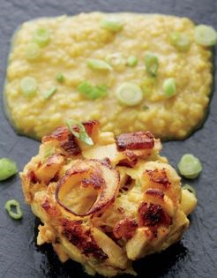 Hearts of palm cakes on curried lentils