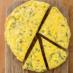 Hearty frittata with bacon, potato, and cheddar
