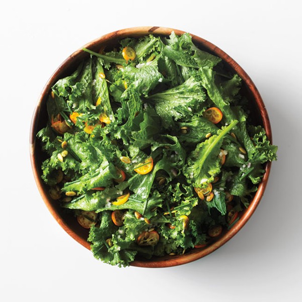 Hearty greens with kumquats