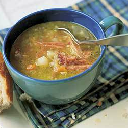 Hearty ham and split pea soup with potatoes