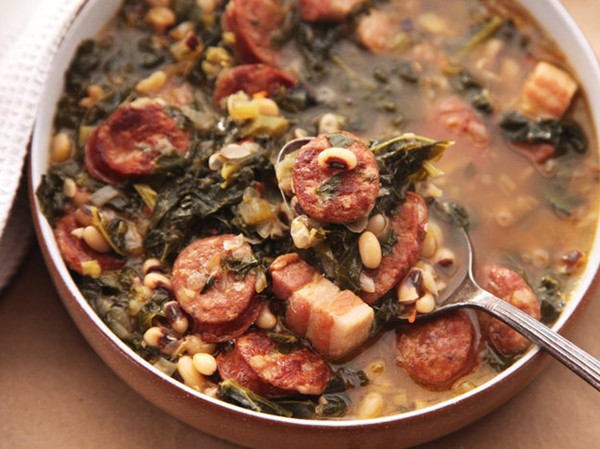 Hearty one-pot black eyed pea stew with kale and andouille