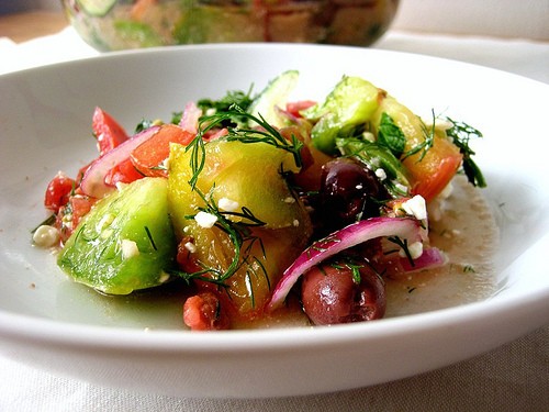 Heirloom tomato salad with red onions, dill and feta