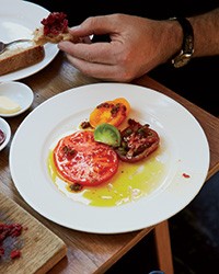 Heirloom tomatoes with anchovies and red chiles