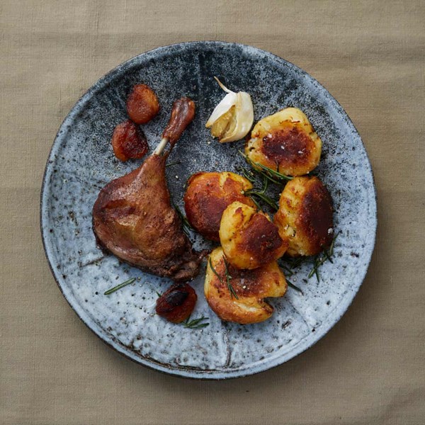 Henry's duck leg with clementines and roast potatoes