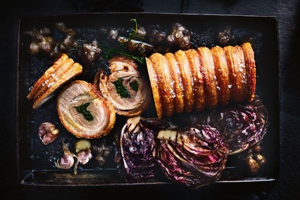 Herb & garlic porchetta with roast winter vegetables