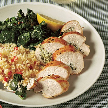 Herb and goat cheese-stuffed chicken breasts with red pepper couscous