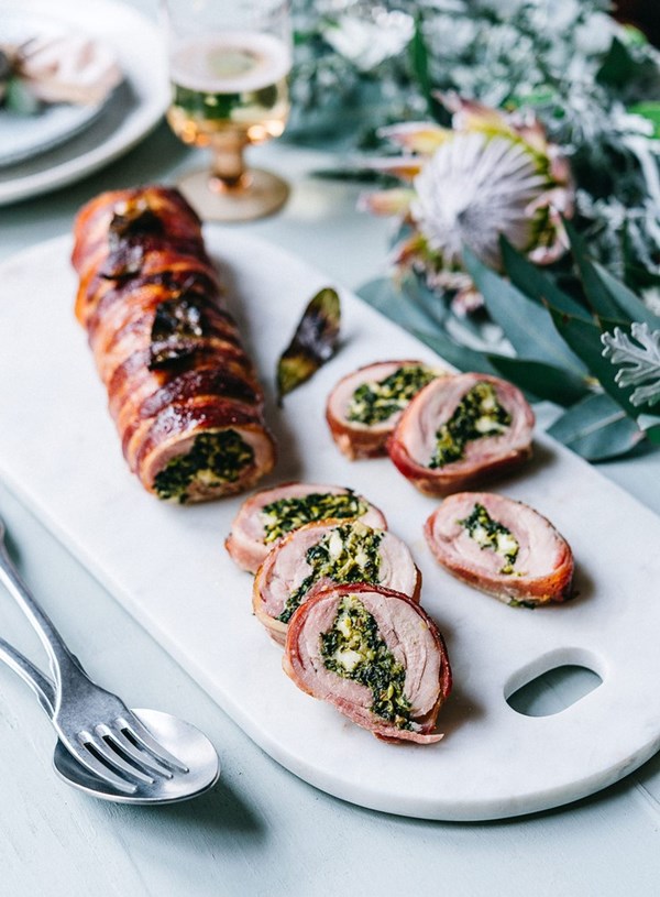 Herb and goat's cheese stuffed chicken in maple bacon
