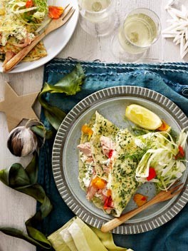Herb crêpes stuffed with ricotta and smoked trout