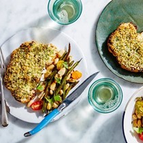 Herb-crusted cauliflower steaks with beans and tomatoes 