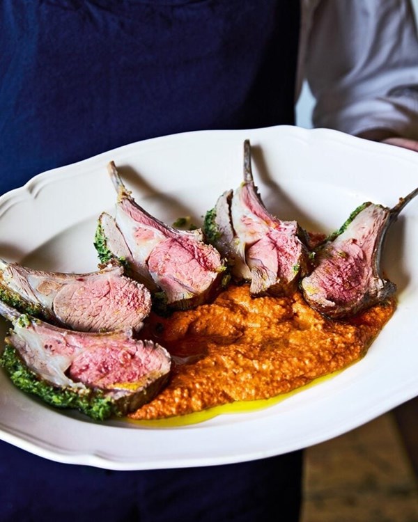 Herb-crusted lamb rack with romesco sauce