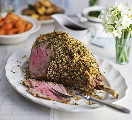 Herb-crusted leg of lamb with red wine gravy