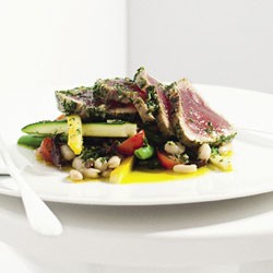 Herb-crusted poached tuna with bean and zucchini salad