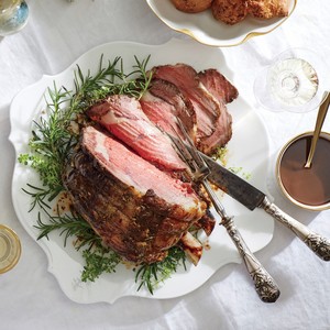 Herb-crusted roast beef and Yorkshire pudding with red wine jus