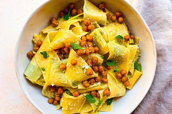 Herb-laminated pappardelle with shallots, crème fraîche & crispy chickpeas