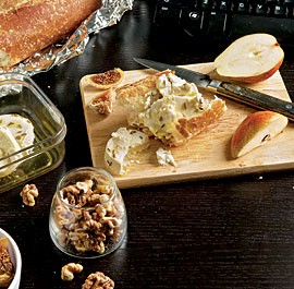Herb-marinated goat cheese with fruit and nuts