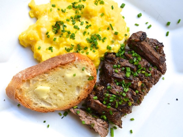 Herb-marinated steak and soft scrambled eggs