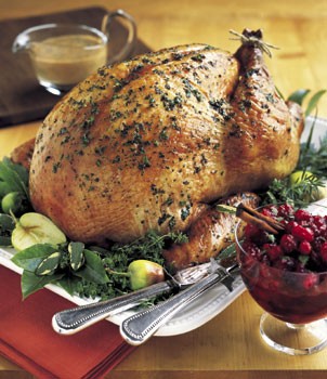 Herb-roasted turkey with apple cider gravy