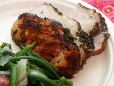 Herb rubbed garlic studded pork