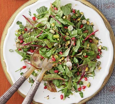 Herb salad with pomegranate and pistachios