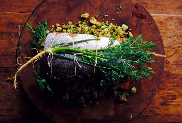 Herb-stuffed baked salmon