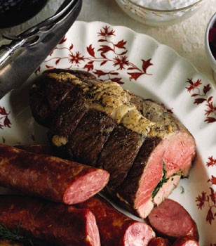 Herb-stuffed leg of lamb