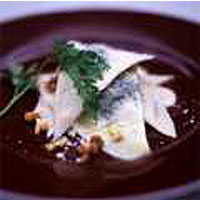 Herb-stuffed ravioli with walnut sauce (Pansoti con salsa di noci)