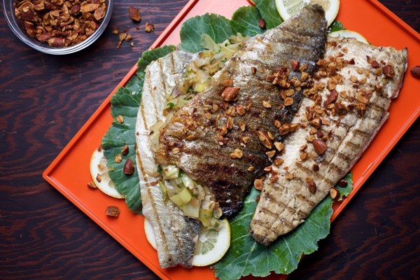 Herb-stuffed trout with savory almond granola