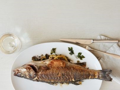 Herb-stuffed whole fish