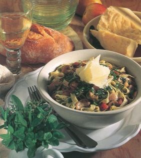 Herb tagliatelle with mushrooms and olive oil