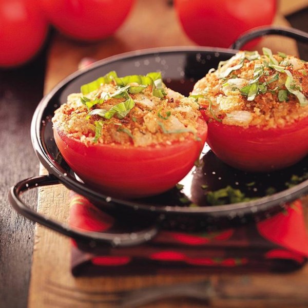 Herb-topped stuffed tomatoes