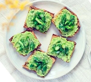 Herbed broad bean & feta crostini with asparagus