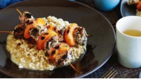 Herbed pork and apricot skewers with barley risotto