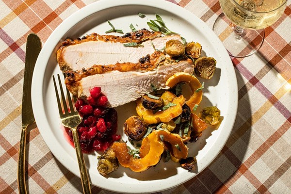 Herbed turkey breast with delicata squash and Brussels sprouts