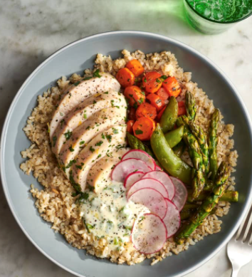 Herby chicken grain bowls with feta dressing