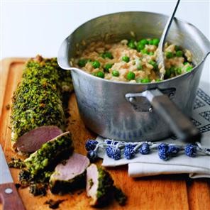 Herby roast pork with pea and ricotta risotto