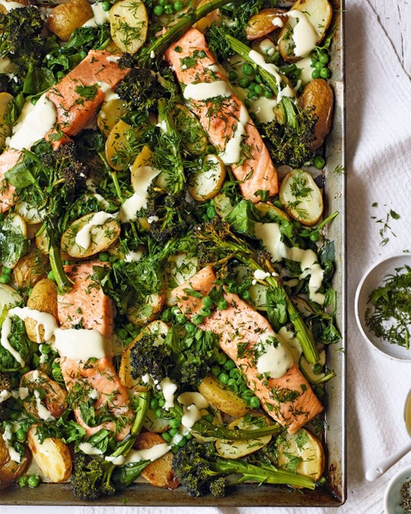 Herby roast salmon, potato and broccoli traybake with mustard sauce
