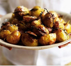 Herby slashed roasties